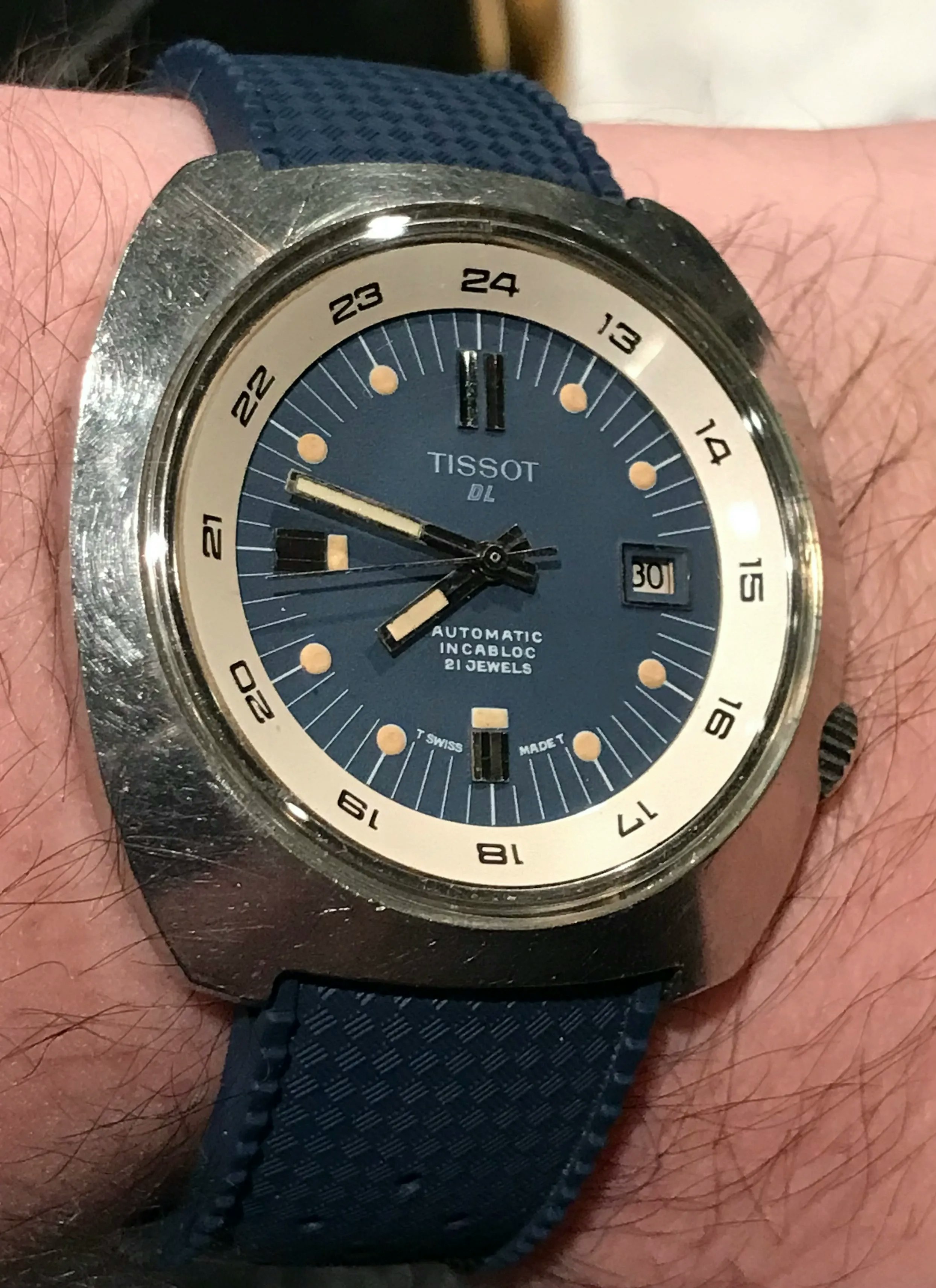 Mido or tissot hotsell